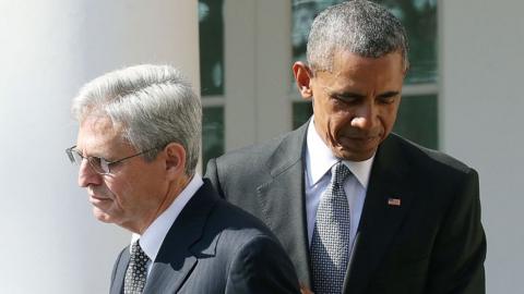 Barack Obama pats Merrick Garland on the back after announcing him as the Supreme Court nominee