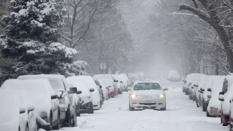 Photo of a car dumped in snow in Chicago