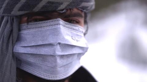 Man in Afghanistan with a face mask