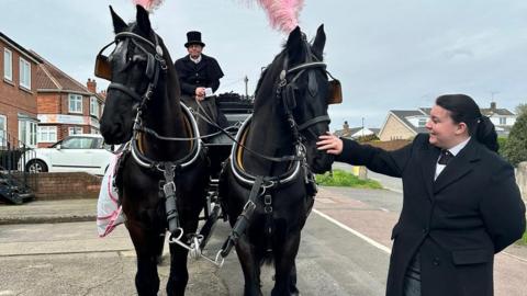 Beth Harron with funeral horses