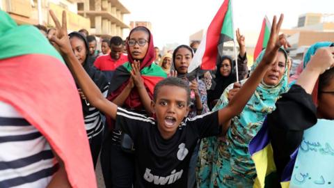 Sudanese students protest against the killing of five people in al-Obeid a day earlier, in Khartoum, Sudan, 30 July 2019