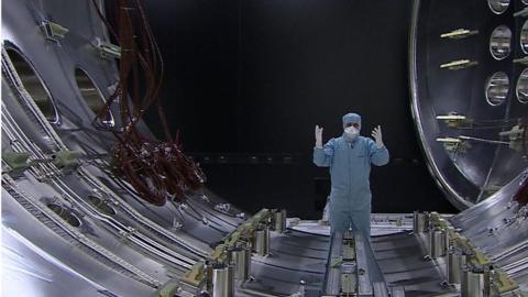 Reporter in space testing chamber