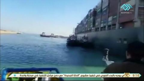 Suez container ship is partially freed