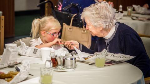 Peyton and Dot at the dinner table