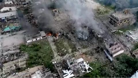destroyed fireworks warehouse in Thailand