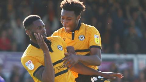 Jamille Matt celebrates with Antoine Semenyo