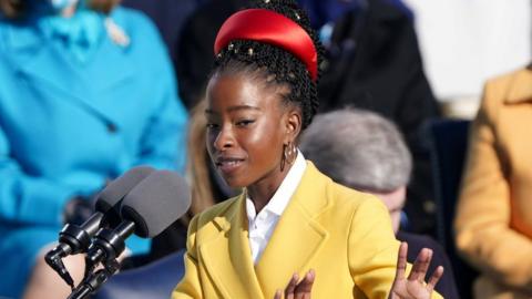 Amanda Gorman recites a poem during the inauguration of Joe Biden as the 46th President of the United States on the West Front of the U.S. Capitol in Washington, U.S., January 20, 2021