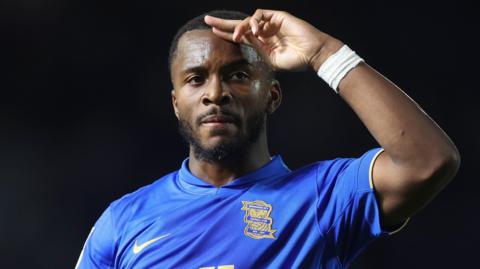 Birmingham City's Ethan Laird salutes the crowd during a match