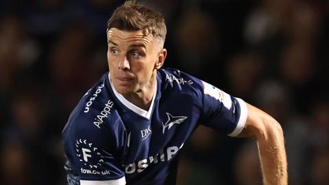 George Ford passes the ball