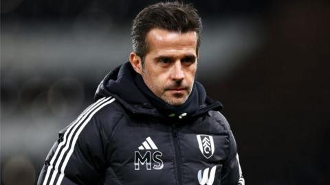 Marco Silva walks on the touchline