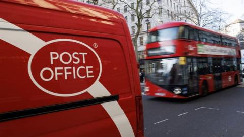 A Post Office van and London bus