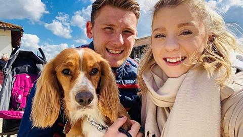 Jordan Shearman and Hannah Washington with puppy Roo