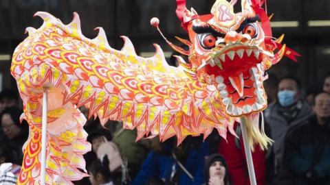performers take part in the Dragon Parade as part of Manchester's Chinese New Year Celebrations