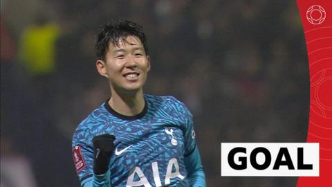 Son Heung-min celebrates getting his second goal of the match