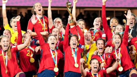 Spain players lift the Women's World Cup