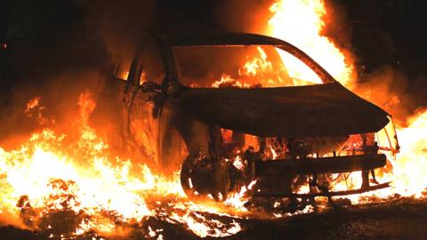 Car in flames in Nanterre