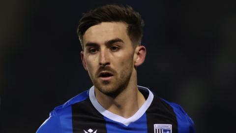 Gillingham defender Robbie McKenzie