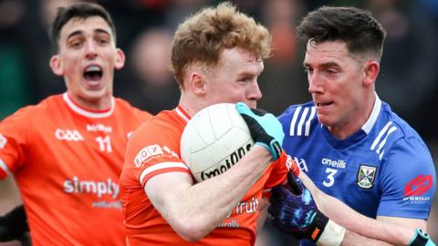 Conor Turbitt (centre) scored Armagh's second goal from the penalty spot