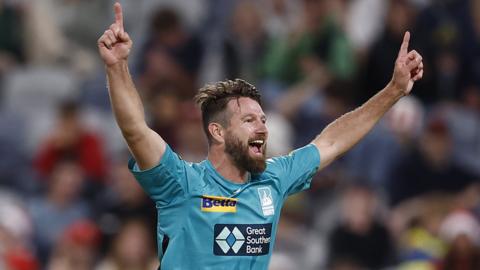 Brisbane Heat bowler Michael Neser celebrates taking a hat-trick against Melbourne Renegades