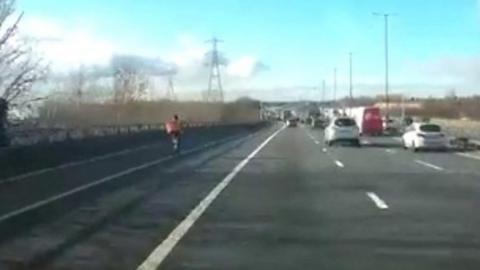 Just Eat cyclist on M6