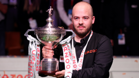Luca Brecel with the World Championship Trophy