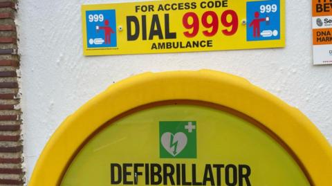 A defibrillator cabinet 