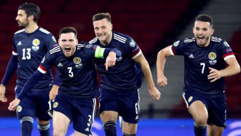 Scotland players celebrate their penalty shootout win over Israel