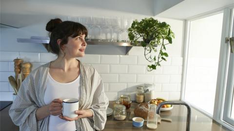 Young women in kitchen