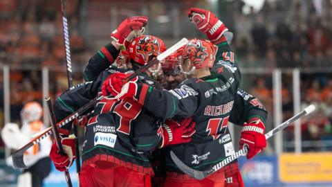 Cardiff Devils players celebrate against Sheffield Steelers