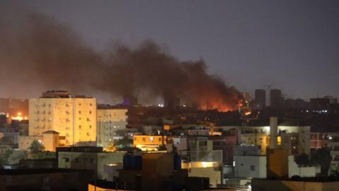 Smoke rises above the Sudanese capital, Khartoum, on Sunday