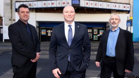 Will Furze, Cllr Nick Kelly and Chris Morgan-Giles outside the former Reel Cinema