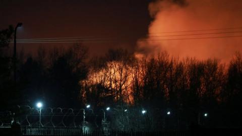 A view shows smoke rising from a fire that broke out at the penal colony after a riot by inmates