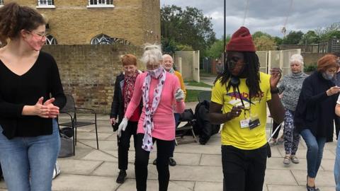 Elderly people dancing