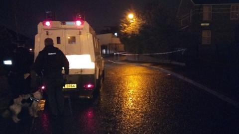 Police landrover and police dog