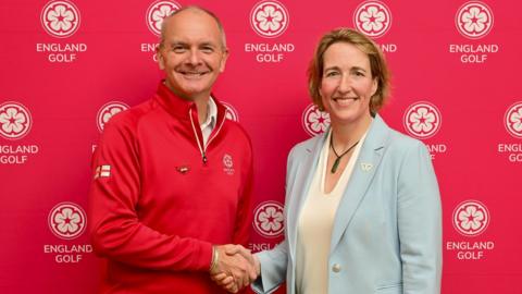 England Golf chief executive Jeremy Tomlinson and Lisa O’Keefe, secretary general of the International Working Group (IWG)