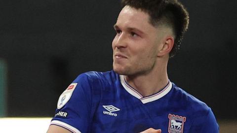 George Hirst celebrates scoring