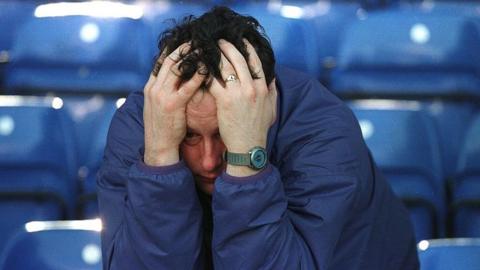 A dejected Manchester City fan after they are relegated from Premier League in 1996