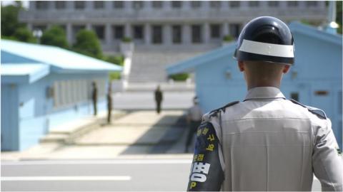 Guard stand at Demilitarised Zone between North and South Korea