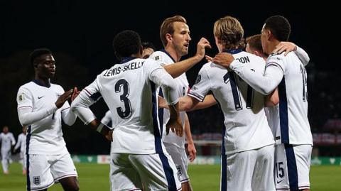England players celebrate Anthony Gordon's goal