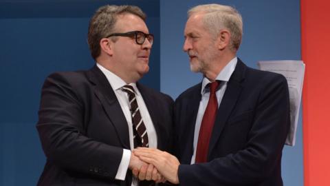 Tom Watson and Jeremy Corbyn shaking hands