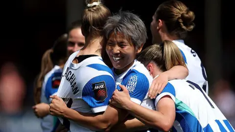 Brighton players celebrate