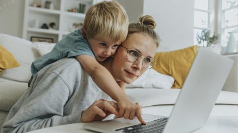 Woman and child working from home