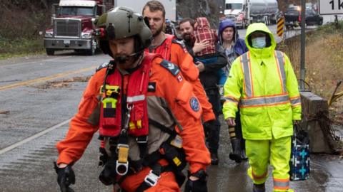 In this handout provided by the Canadian Armed Forces, A CH149 Cormorant and its crew from 442 Search and Rescue Squadron provide support after flooding in British Columbia