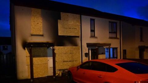 boarded up house in Holywood county down after petrol bomb attack