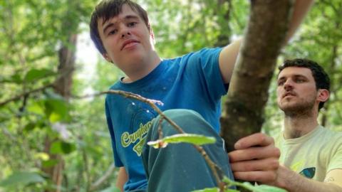 Joseph climbing trees