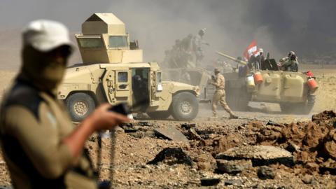 Iraqi soldiers battle Islamic State militants in Ayadiya, north-west of Tal Afar, Iraq (28 August 2017)