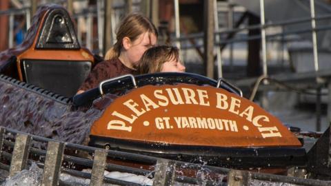 Two children on the Great Yarmouth Pleasure Beach log flume