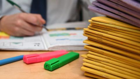 Library image of school books and highlighter pens