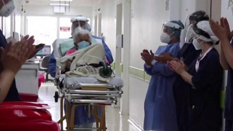 Hospital staff clap for 104-year-old who beat coronavirus twice