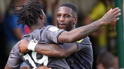 Omar Bogle and Thierry Nevers celebrate one of Newport's goals